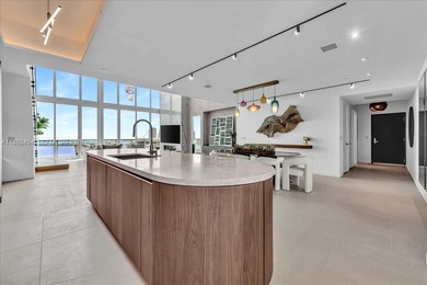A TRUE MASTERPIECE! Fully Renovated 2 Story Penthouse with over