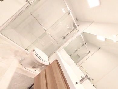 Fully renovated, bright and modern two-story home in the heart - photo 16