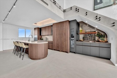 A TRUE MASTERPIECE! Fully Renovated 2 Story Penthouse with over