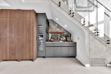 A TRUE MASTERPIECE! Fully Renovated 2 Story Penthouse with over