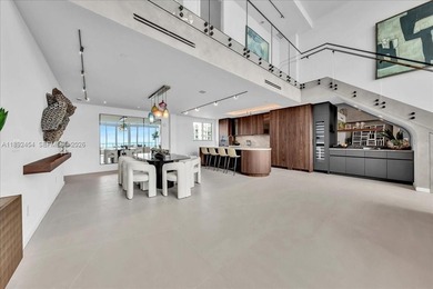 A TRUE MASTERPIECE! Fully Renovated 2 Story Penthouse with over