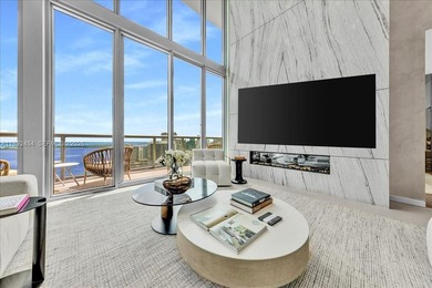 A TRUE MASTERPIECE! Fully Renovated 2 Story Penthouse with over