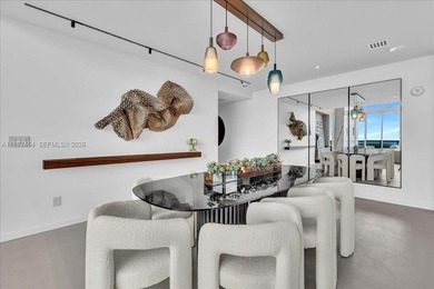 A TRUE MASTERPIECE! Fully Renovated 2 Story Penthouse with over