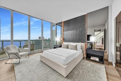 A TRUE MASTERPIECE! Fully Renovated 2 Story Penthouse with over