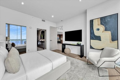 A TRUE MASTERPIECE! Fully Renovated 2 Story Penthouse with over