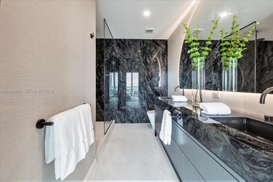 A TRUE MASTERPIECE! Fully Renovated 2 Story Penthouse with over