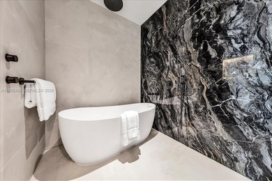 A TRUE MASTERPIECE! Fully Renovated 2 Story Penthouse with over