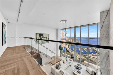 A TRUE MASTERPIECE! Fully Renovated 2 Story Penthouse with over