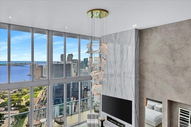 A TRUE MASTERPIECE! Fully Renovated 2 Story Penthouse with over