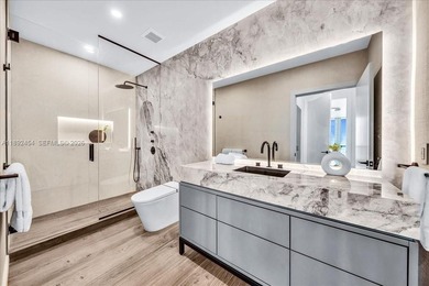 A TRUE MASTERPIECE! Fully Renovated 2 Story Penthouse with over