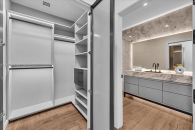 A TRUE MASTERPIECE! Fully Renovated 2 Story Penthouse with over