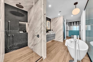 A TRUE MASTERPIECE! Fully Renovated 2 Story Penthouse with over