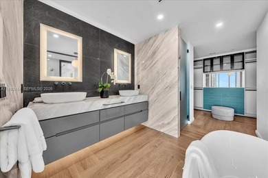 A TRUE MASTERPIECE! Fully Renovated 2 Story Penthouse with over