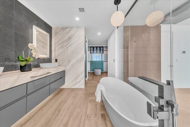 A TRUE MASTERPIECE! Fully Renovated 2 Story Penthouse with over