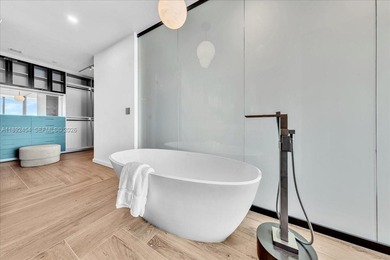 A TRUE MASTERPIECE! Fully Renovated 2 Story Penthouse with over