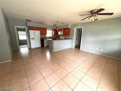 Welcome home to this spacious 4-bedroom, 2-bath residence in the - photo 3