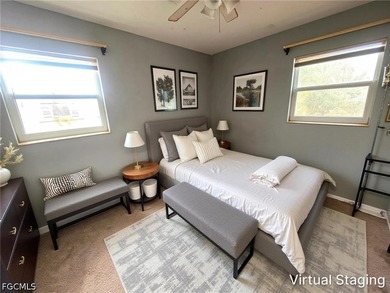 Welcome home to this spacious 4-bedroom, 2-bath residence in the - photo 8