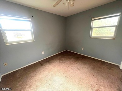 Welcome home to this spacious 4-bedroom, 2-bath residence in the - photo 9