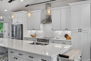 COMPLETELY RENOVATED FULLY FURNISHED 3 BEDROOM+1 UNDESIGNATED - photo 16