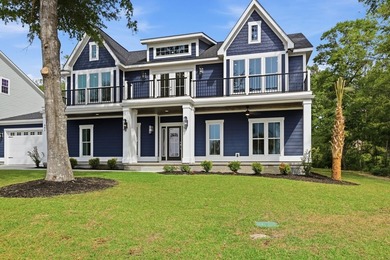Welcome to 903 Inlet View Drive in the coveted gated community - photo 1