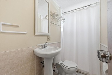 Welcome to this charming three-bedroom, two-bathroom home in - photo 22