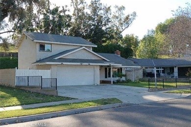 Highly desirable 4 Bedroom 2 Bathroom Two Story Home is nestled