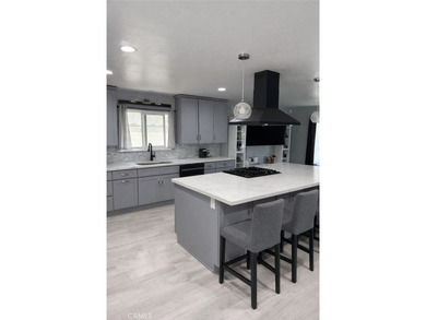 Highly desirable 4 Bedroom 2 Bathroom Two Story Home is nestled