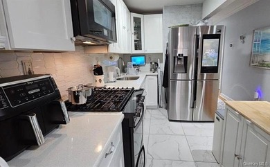 Welcome to **175 Beach 29th Street** - A Turnkey Legal Duplex in - photo 5