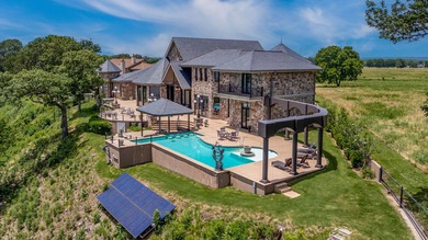 Indulge in luxury living at Eagle Bluff, where panoramic lake - photo 2