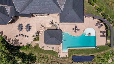 Indulge in luxury living at Eagle Bluff, where panoramic lake - photo 3