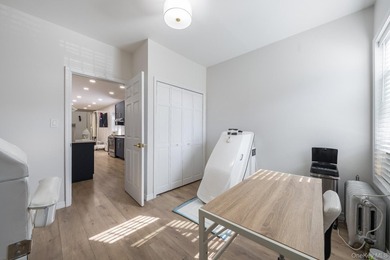 Welcome to this unique three-family home, a strong income - photo 12