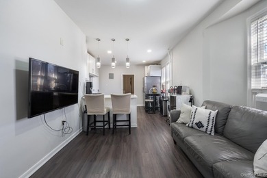 Welcome to this unique three-family home, a strong income - photo 20