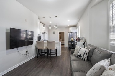 Welcome to this unique three-family home, a strong income - photo 21
