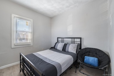 Welcome to this unique three-family home, a strong income - photo 22