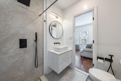 Welcome to this unique three-family home, a strong income - photo 34