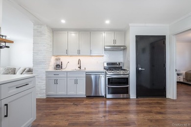 Welcome to this unique three-family home, a strong income - photo 37