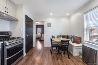 Welcome to this unique three-family home, a strong income - photo 38