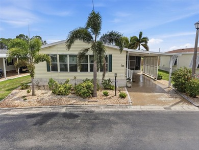 This impeccably maintained and move-in-ready manufactured home - photo 1