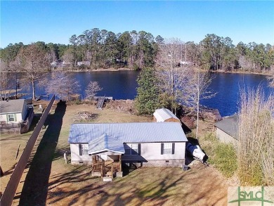 Lake Home For Sale in Ellabell, Georgia