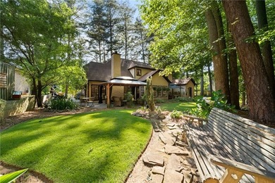 Welcome to this charming European-style home tucked away on a - photo 29