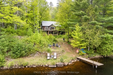 Tucked away at the end of a quiet lane on Centennial Lake, 176 - photo 1