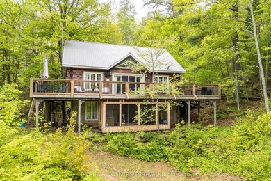 Tucked away at the end of a quiet lane on Centennial Lake, 176 - photo 2