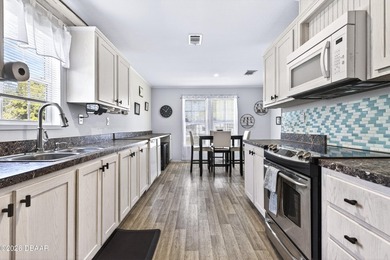 * LAND INCLUDED * Discover this charming 3-bedroom, 2-bathroom - photo 3