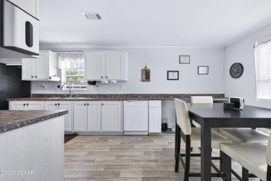 * LAND INCLUDED * Discover this charming 3-bedroom, 2-bathroom - photo 8