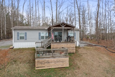 Smith Lake (Crooked Creek) Big views from the covered porch of - Lake Home For Sale in Crane Hill, Alabama