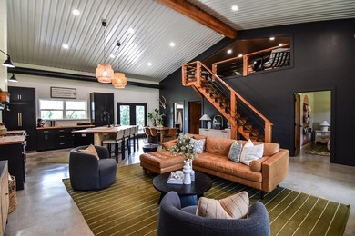 Meticulously maintained and beautifully custom built, this - photo 4