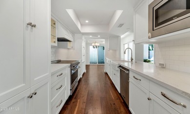Located in a prestigious gated community at the world-renowned - photo 16