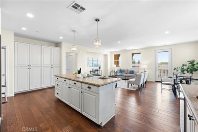 Introducing a stunning top-floor, single-story residence in the - photo 16