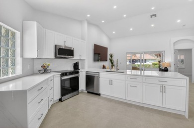 Exquisitely remodeled 3-bedroom, 2-bath corner villa in the - photo 17