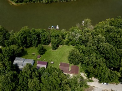 Beautiful updates, Waterfront home with a garage and end dock! - photo 24